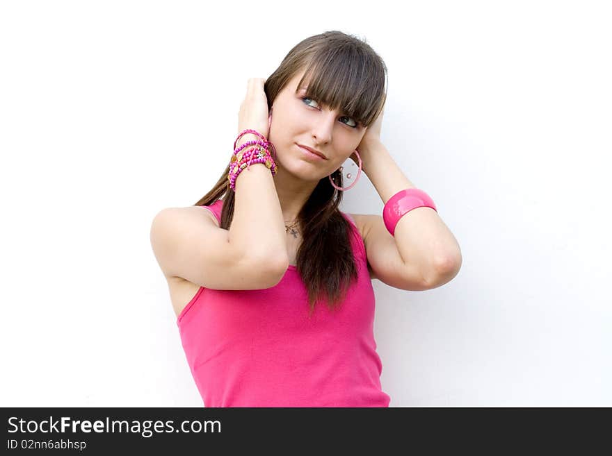 Girl in pink shirt posing outdoor. Girl in pink shirt posing outdoor