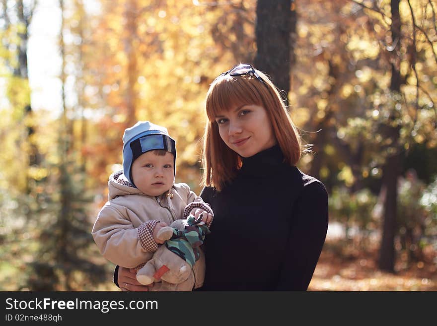 Baby boy with mother play in park. Baby boy with mother play in park