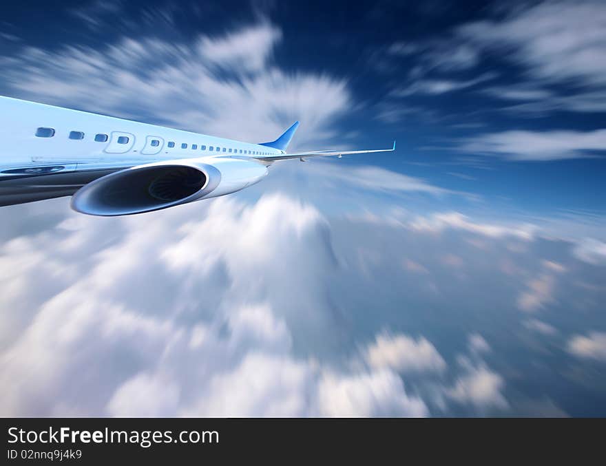 Airplane flying above perfect clouds with motion effect. Airplane flying above perfect clouds with motion effect