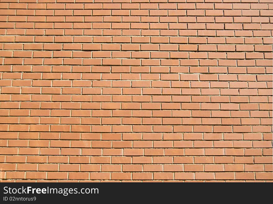 Red brick textured background. Side wall of the new building. Red brick textured background. Side wall of the new building.