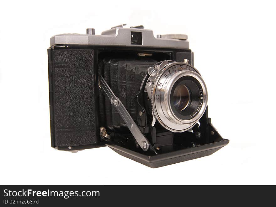 Old photo camera isolated on white background