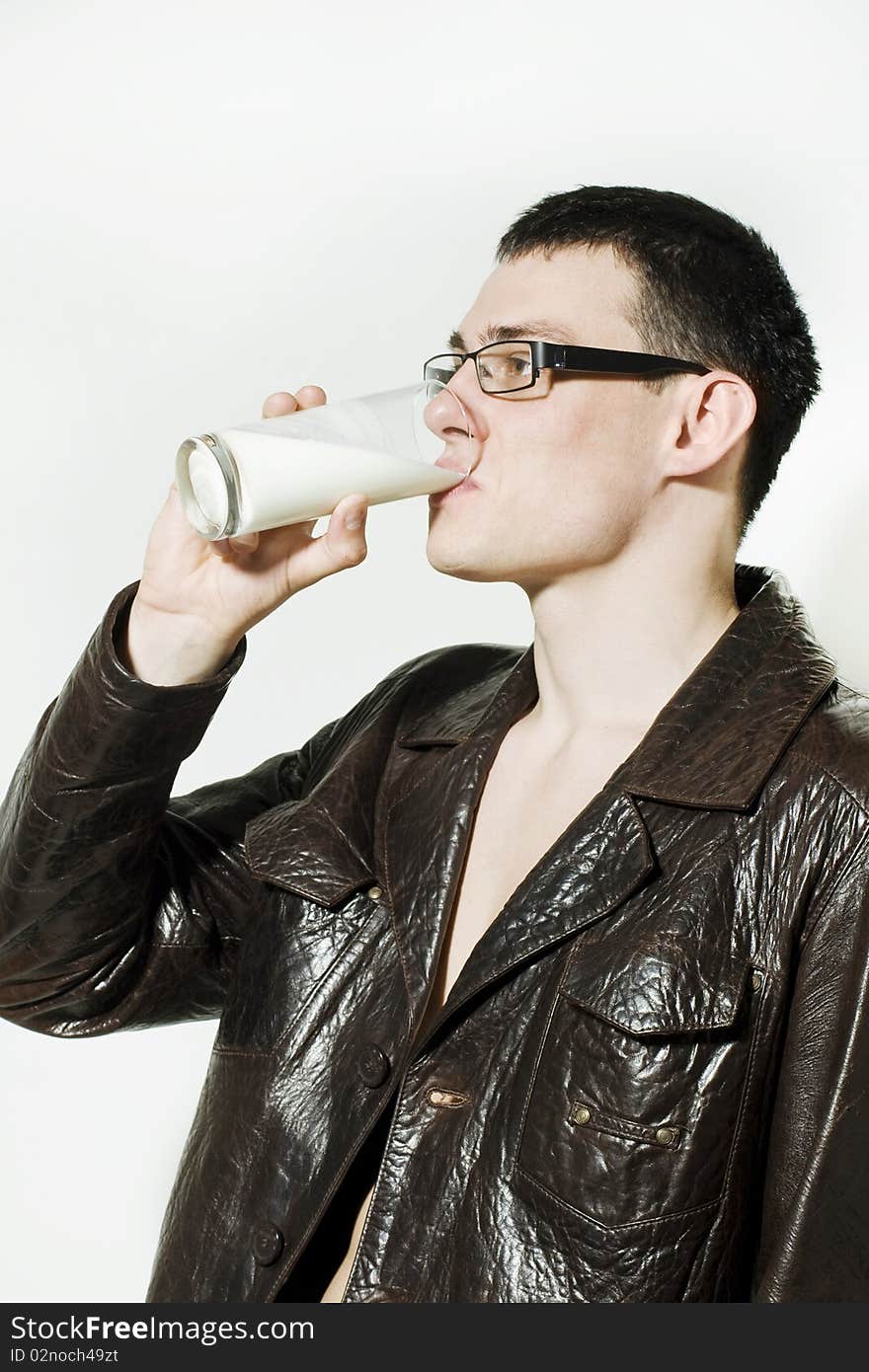 Young man drinking milk