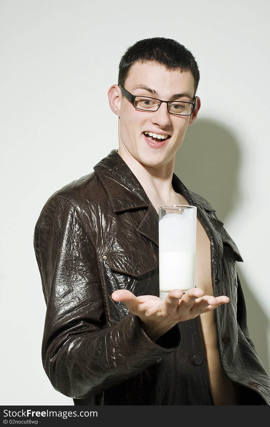 Young man holding milk