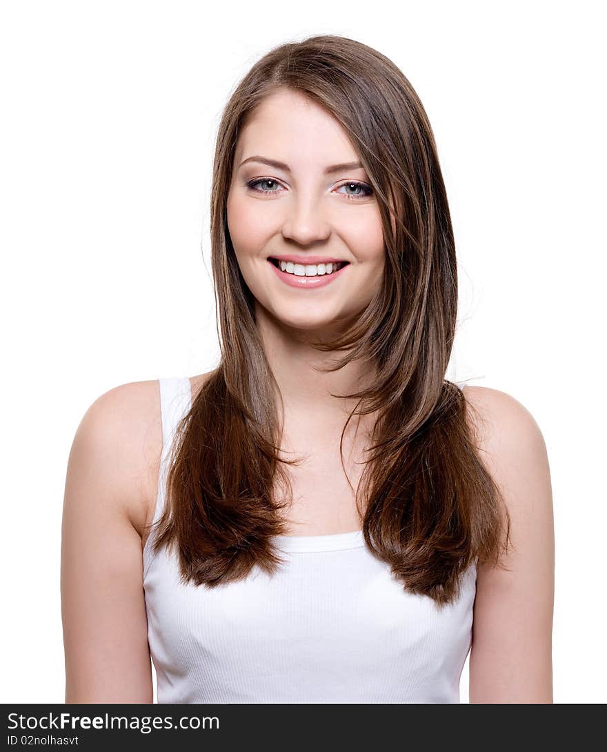 Close-up portrait of a beautiful smiling young woman with healthy teeth