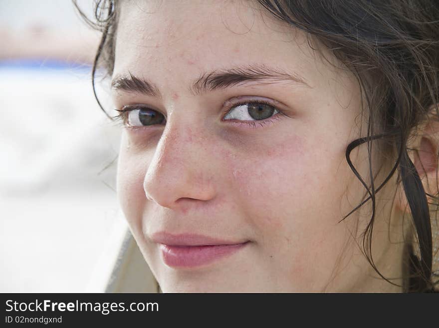 Portrait of girl with her face wet