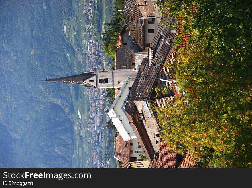 A view of the The view of Alpine-South Tyrol with the background of valley and church. A view of the The view of Alpine-South Tyrol with the background of valley and church.