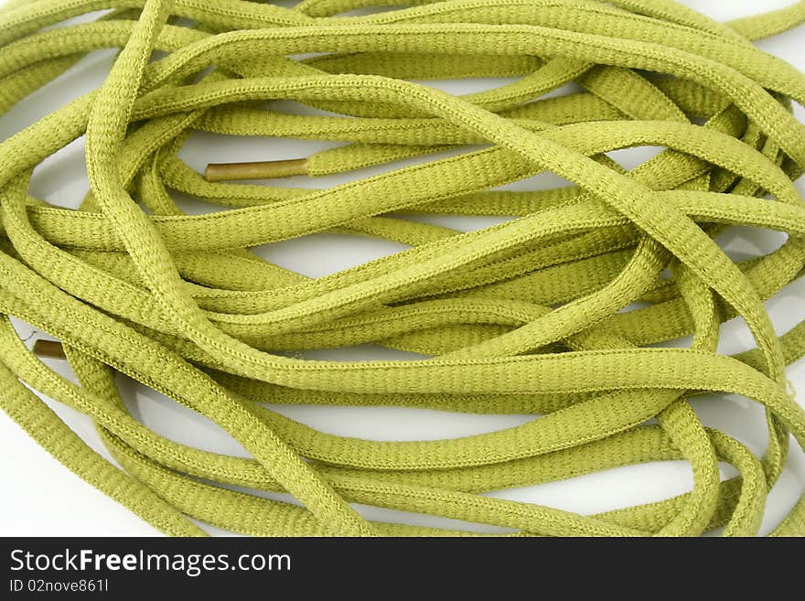 Rope with knot close up. Isolated on white background.