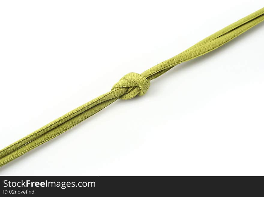 Rope with knot close up. Isolated on white background.