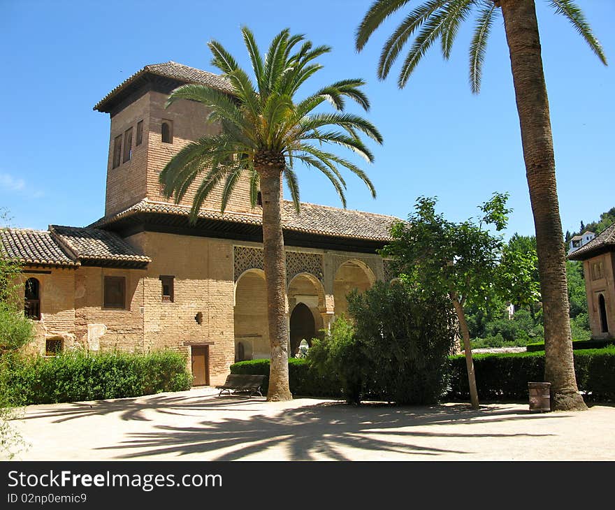 View of a building from inside the Alhambra, Granada, Spain. View of a building from inside the Alhambra, Granada, Spain