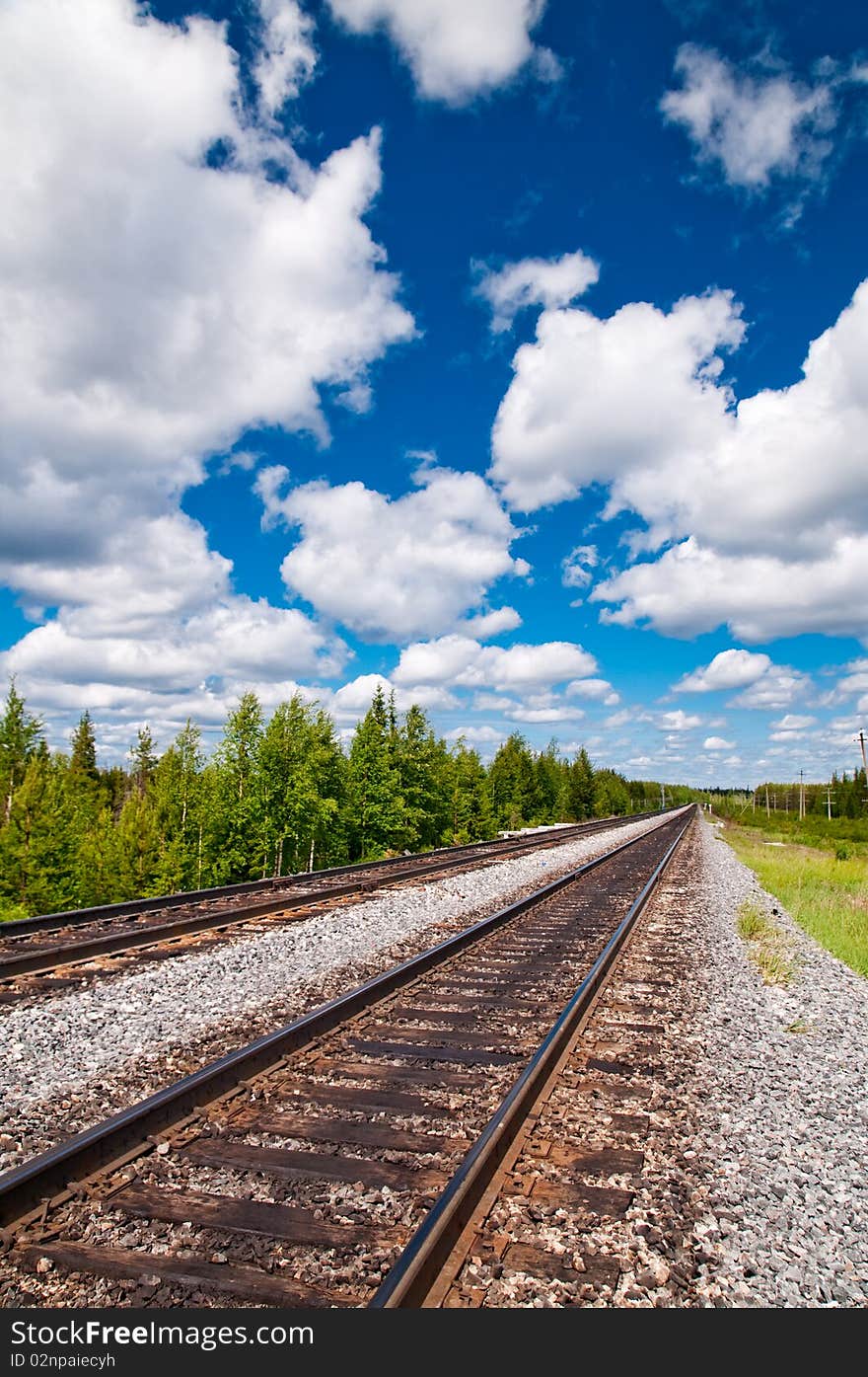 Railway tracks on background of scenery