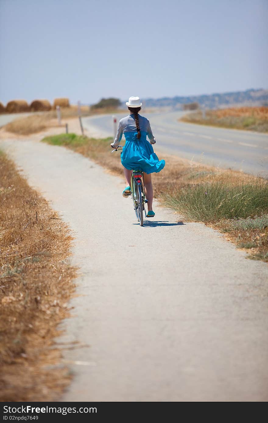 Beautiful Girl Riding Bicycle