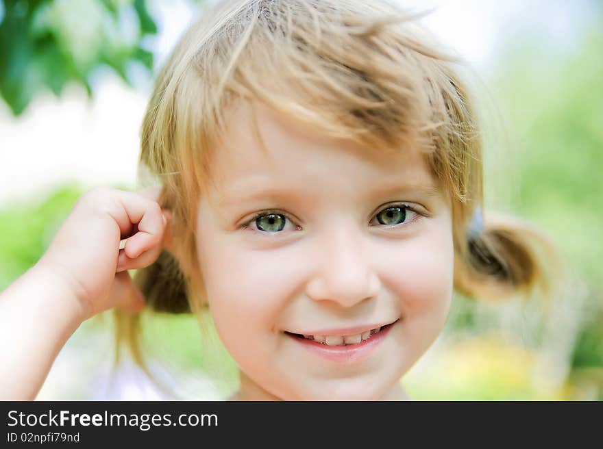 Portrait of a cute liitle girl close-up