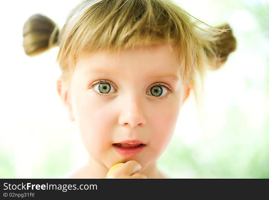 Close-up portrait of a cute liitle girl. Close-up portrait of a cute liitle girl