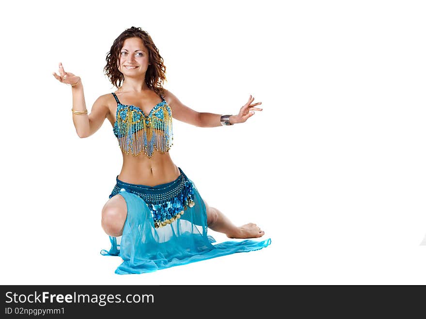 Young Belly dancer posing sitting on the floor