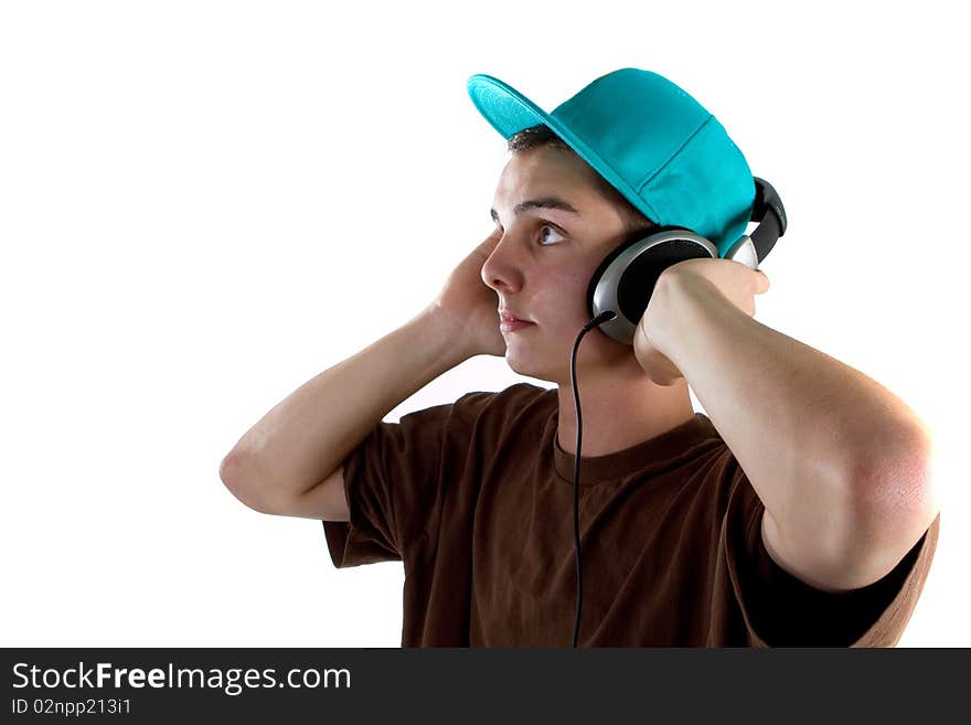 Young fresh teenager with headphones isolated over a white background. Young fresh teenager with headphones isolated over a white background.