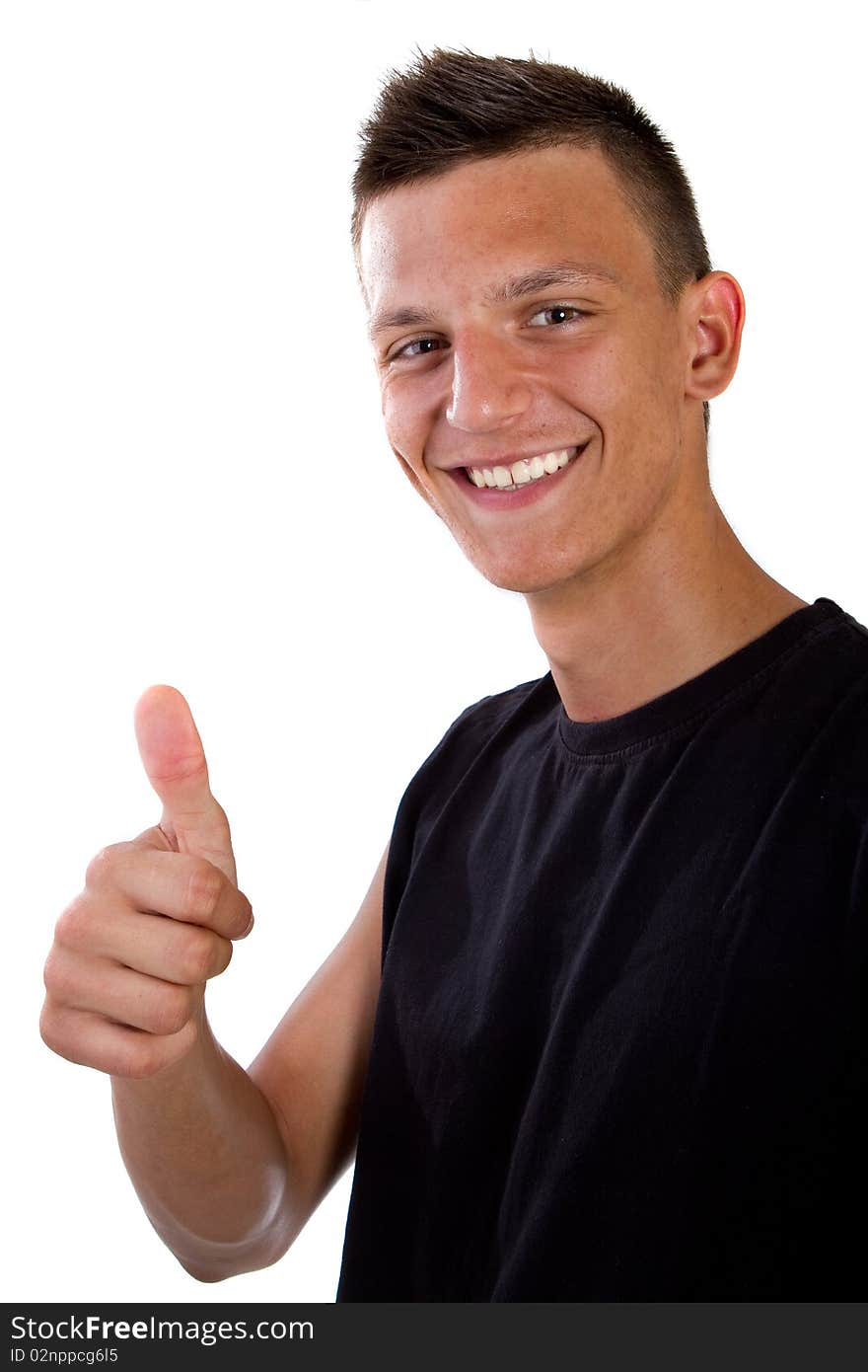 Young fresh teenager is posing with a thumb up sign. Isolated over white. Young fresh teenager is posing with a thumb up sign. Isolated over white.