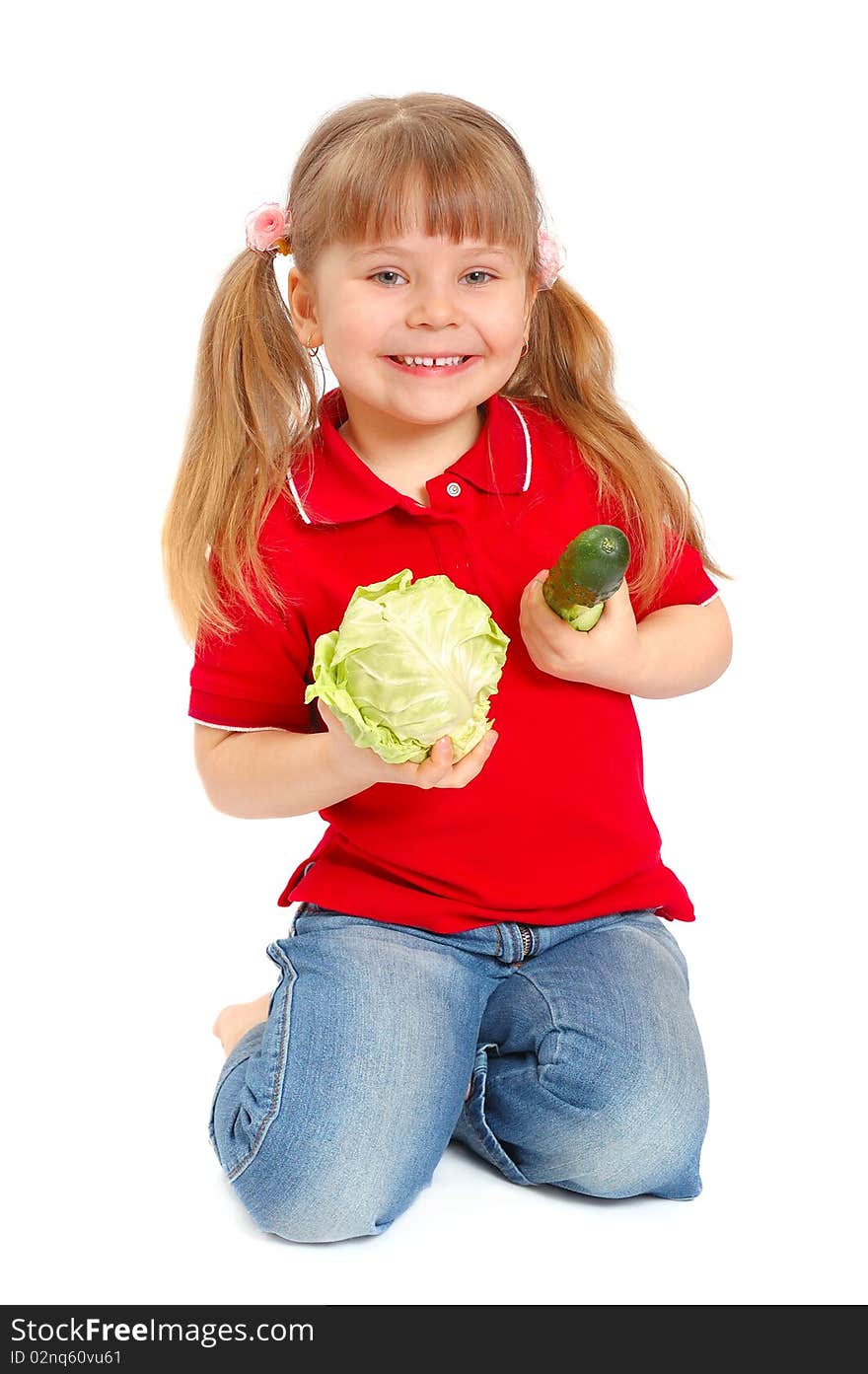 Girl with vegetables on the white