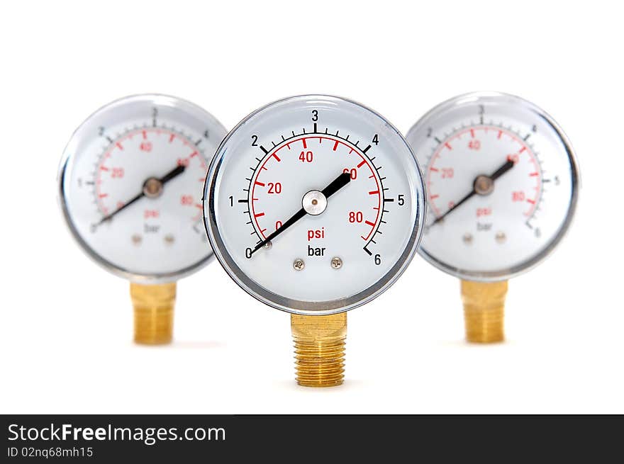 Three measuring devices on a white background