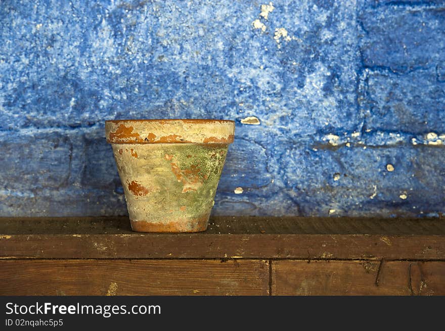 An Old Clay Plant Pot In A Potting Shed. An Old Clay Plant Pot In A Potting Shed