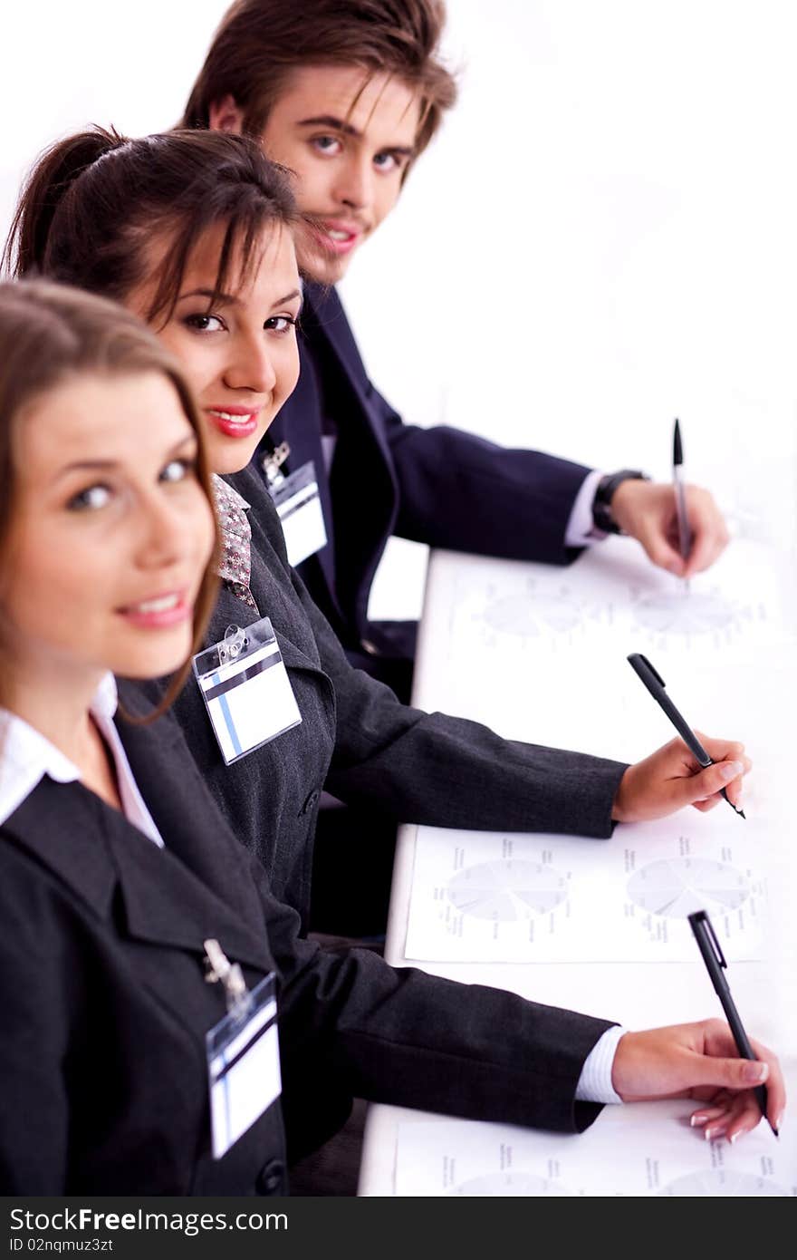 Closeup of attractive business woman with colleague