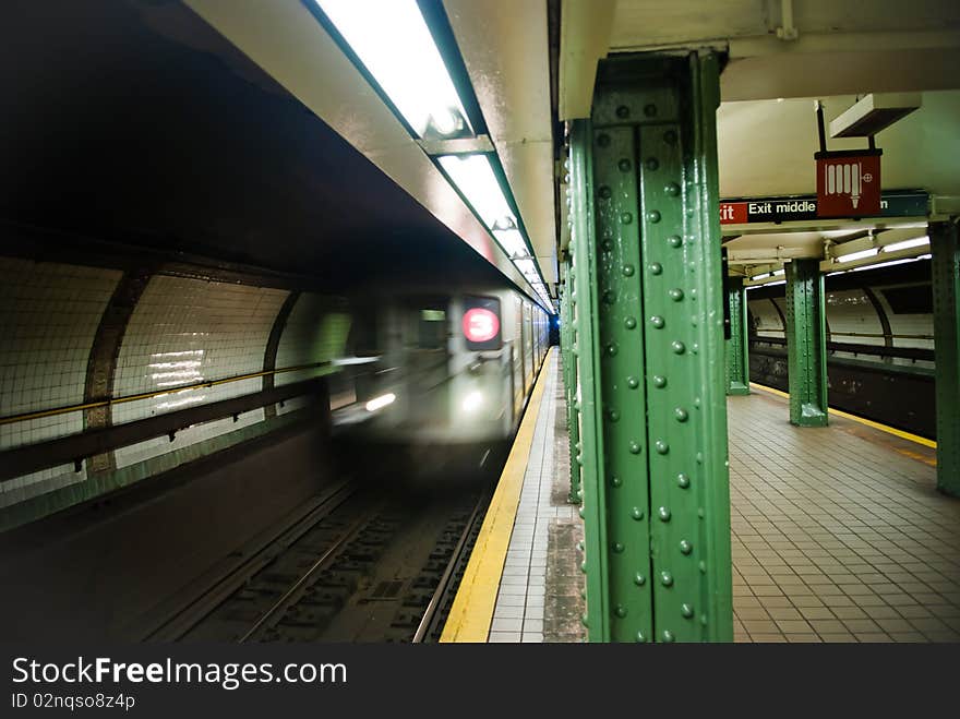 Subway car pulling into station in Brooklyn, New York.