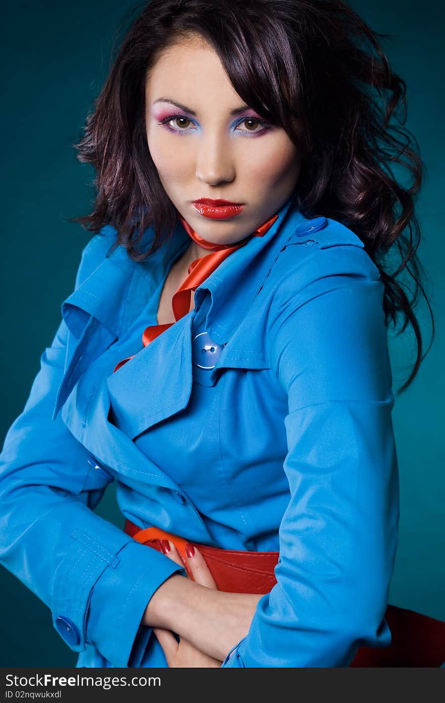 fashionable woman in blue jacket