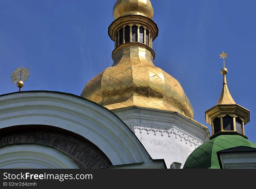 Ukraine russian historical basilica detail spire with gold roof. Ukraine russian historical basilica detail spire with gold roof