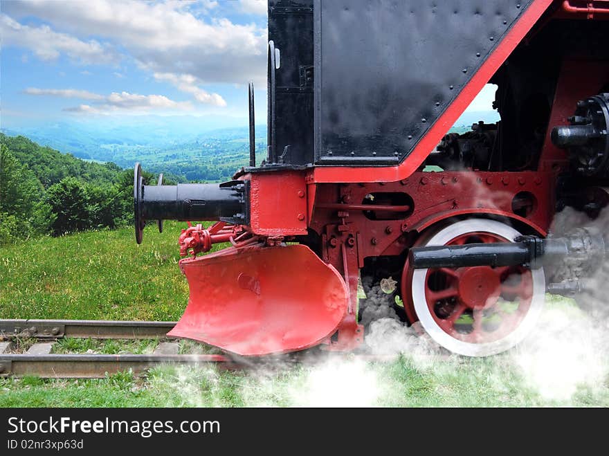 The old-fashioned steam locomotive stationary - front detail. The old-fashioned steam locomotive stationary - front detail