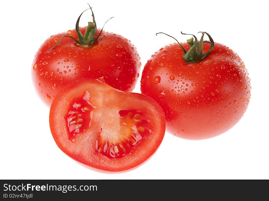 Fresh juicy tomatoes on white background