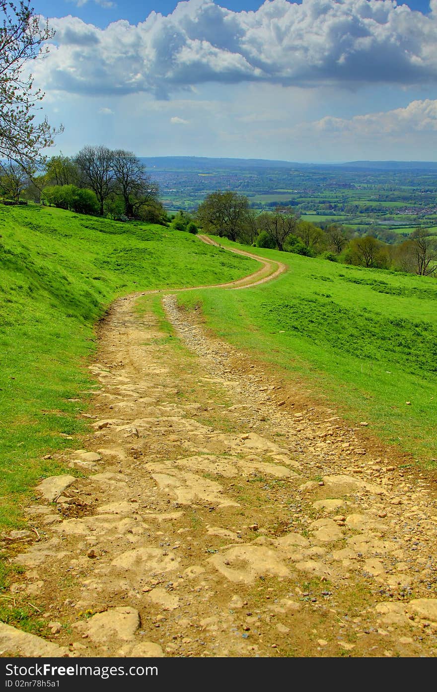 A winding trail through beautiful English countryside in the Cotswolds. A winding trail through beautiful English countryside in the Cotswolds