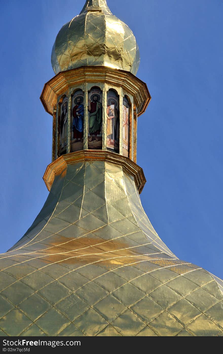 Ukraine russian historical basilica detail spire with gold roof and apostles. Ukraine russian historical basilica detail spire with gold roof and apostles