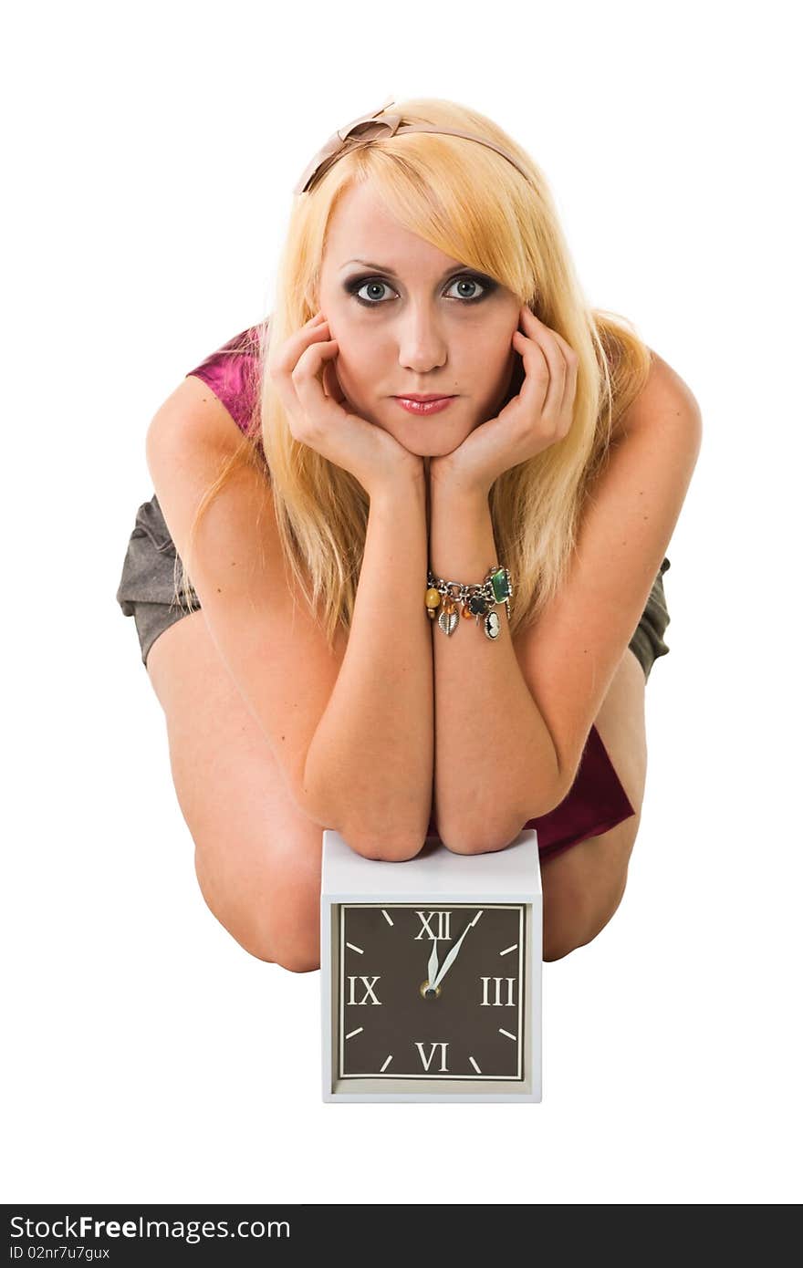 Young blond woman with a clock. Young blond woman with a clock