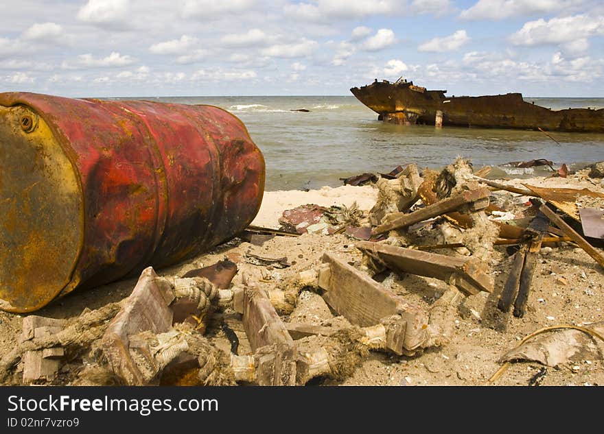 Rasty remnants of an old ship washed up on the beach by storm. Rasty remnants of an old ship washed up on the beach by storm