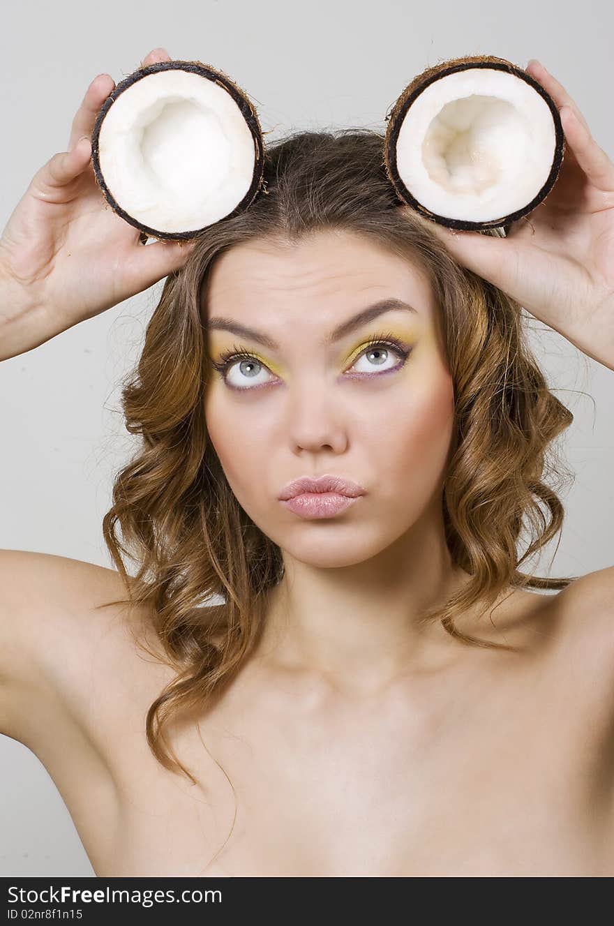 Beautiful girl with coconut