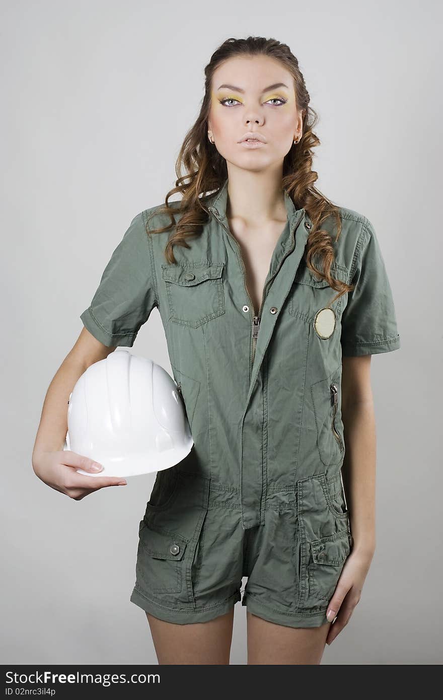 Pretty woman worker with white helmet. Pretty woman worker with white helmet