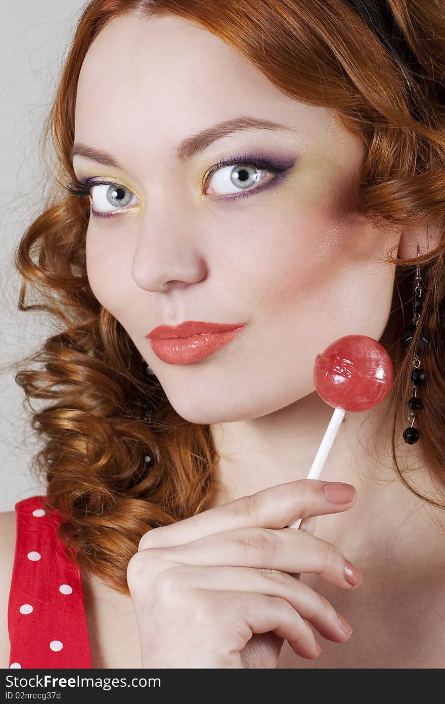 Woman holding sweet sugar candy closeup. Woman holding sweet sugar candy closeup.