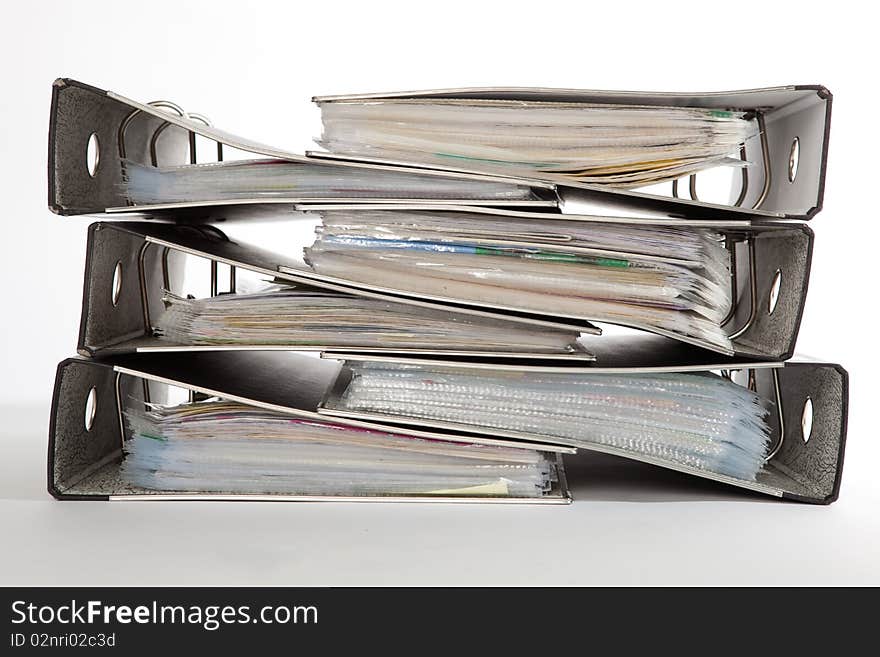 Stack Of Folders On A White Isolated Background