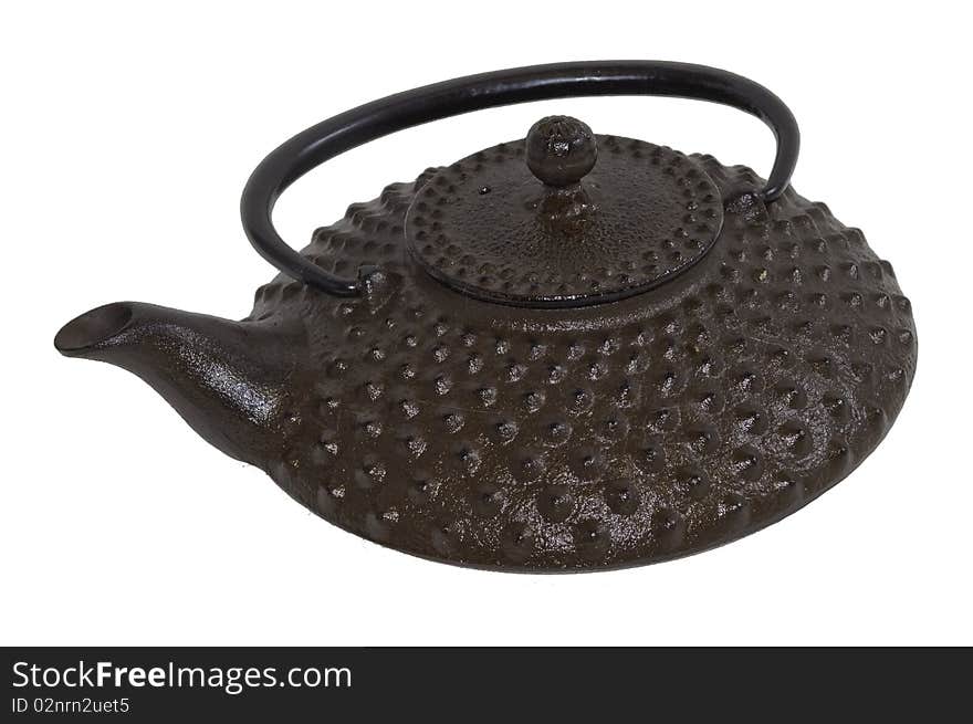 A Cast Iron Tetsubin used to make tea on a white background