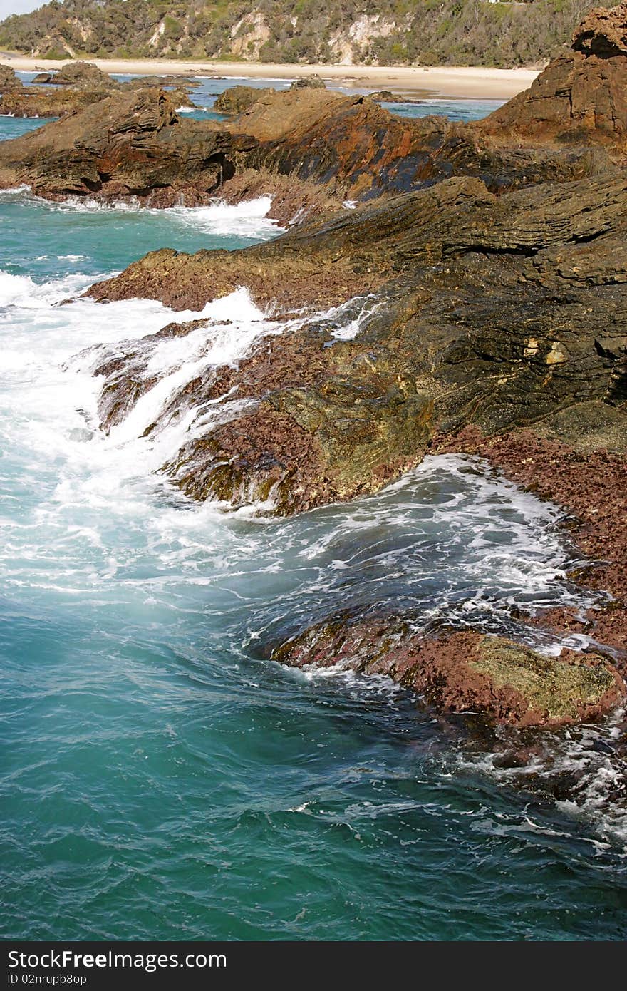 Waves Crashing on The Rocks