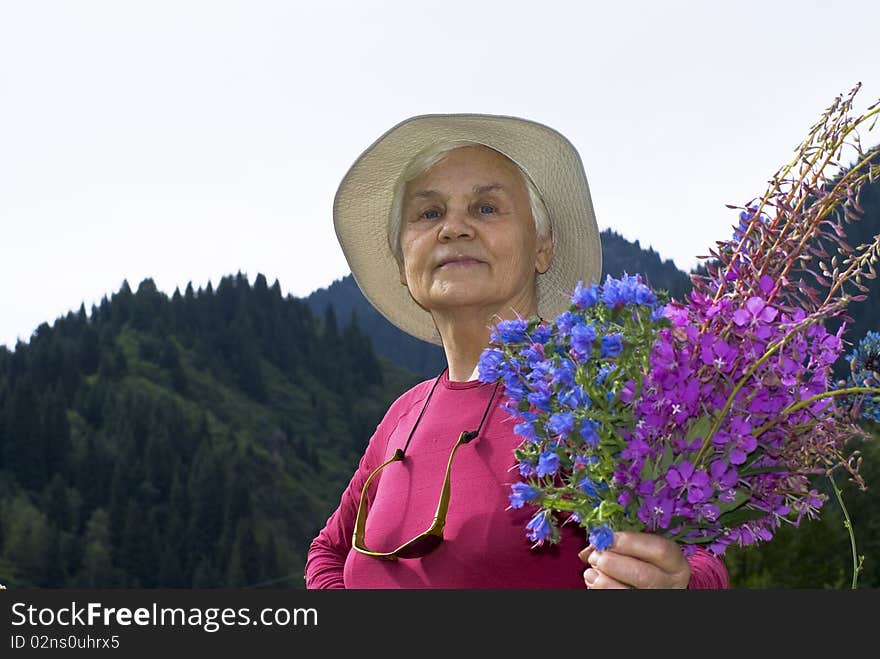 Mature woman with flowers