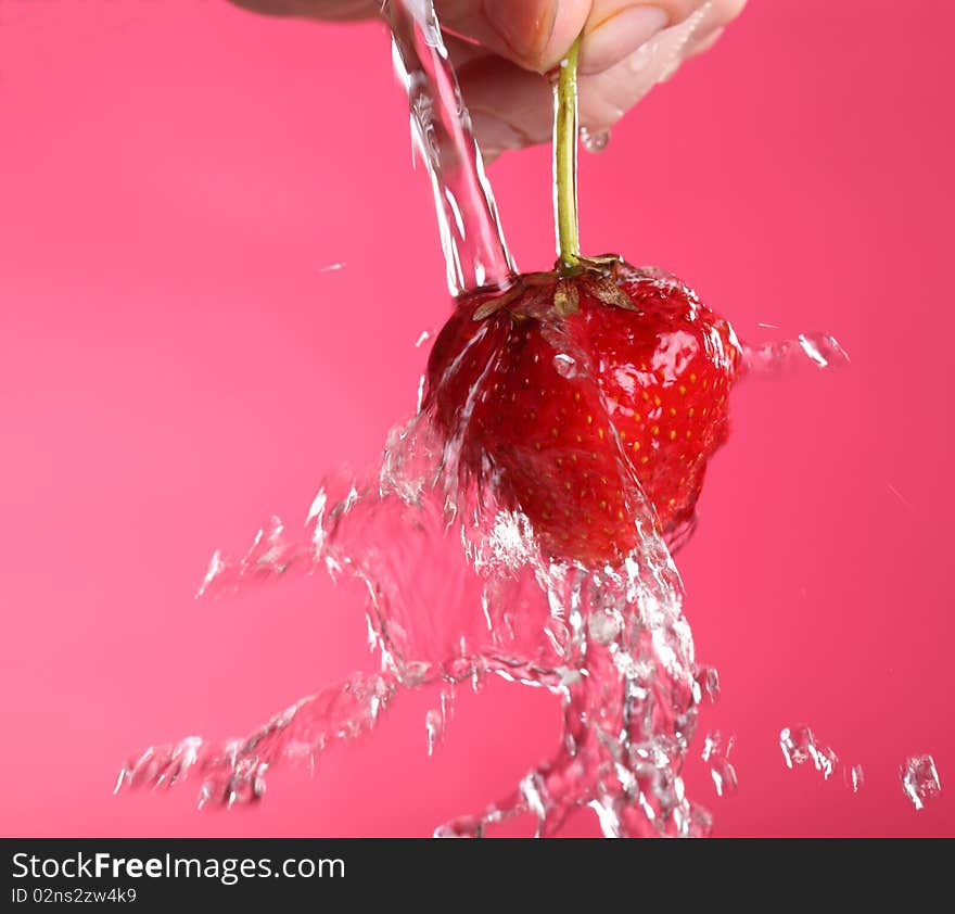 Close-up view of washed fresh strawberry