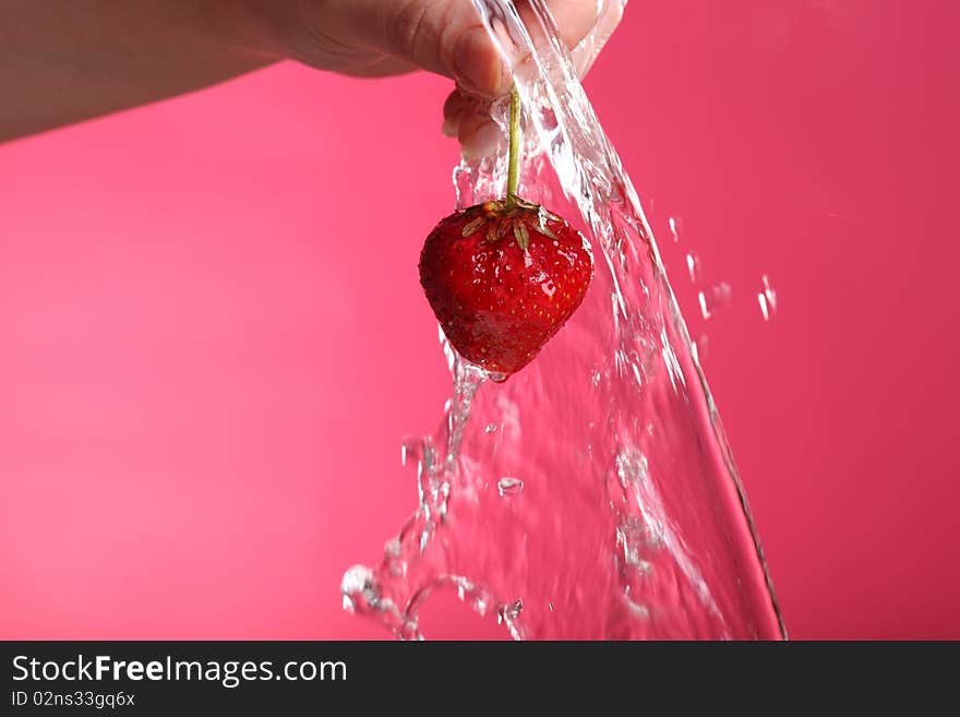 Close-up view of washed fresh strawberry