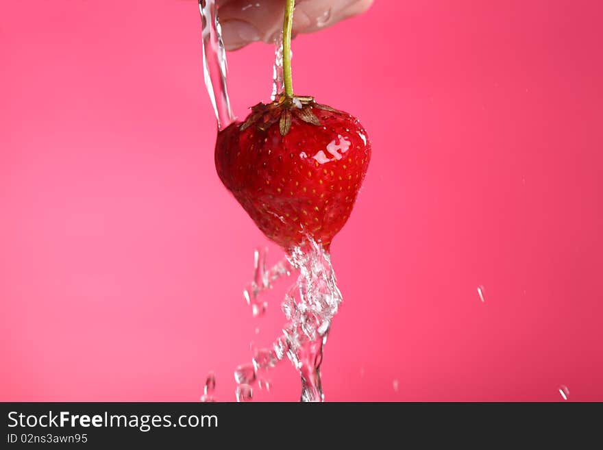 Close-up view of washed fresh strawberry