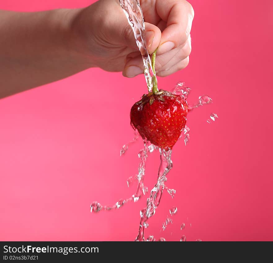 Close-up view of washed fresh strawberry