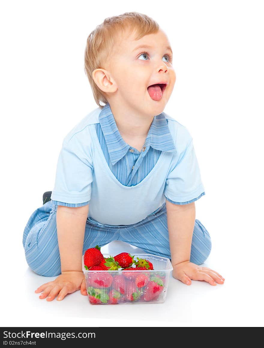 Boy with strawberry. Isolated on white background