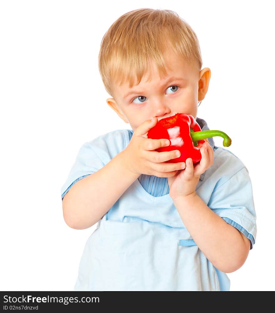 Boy with sweet pepper. Isolated on white