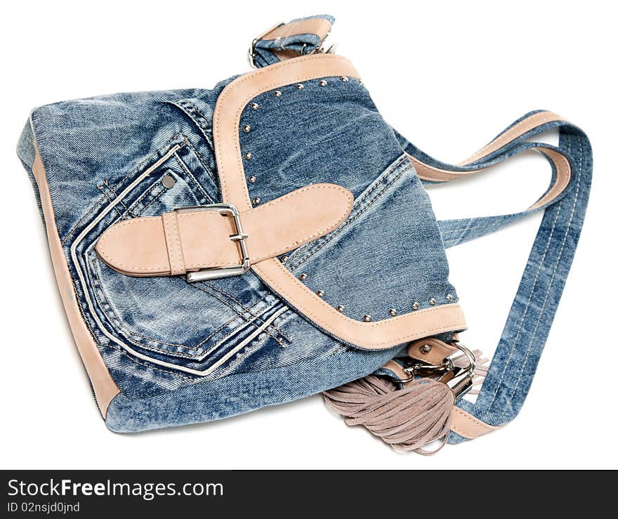 Feminine jeans bag with leather insertion on white background