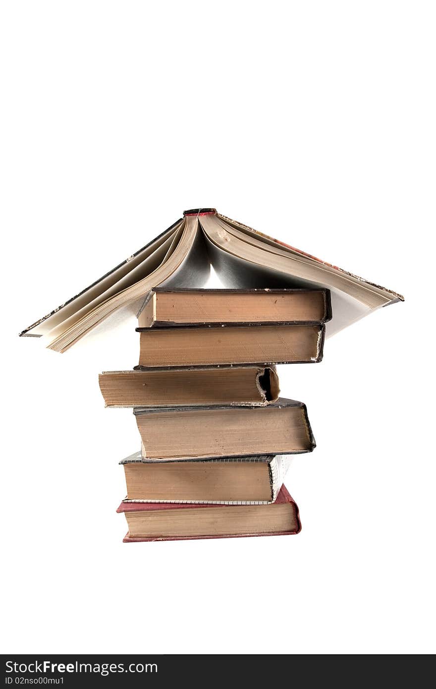 Stack of books on white background