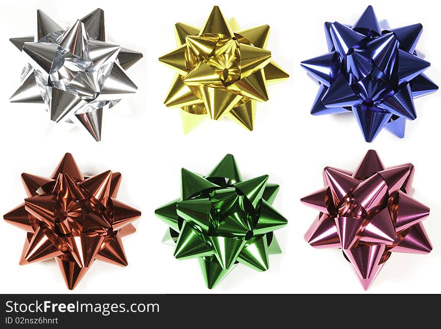 Set of 6 stars made with glossy paper, to decorate gifts. Set of 6 stars made with glossy paper, to decorate gifts