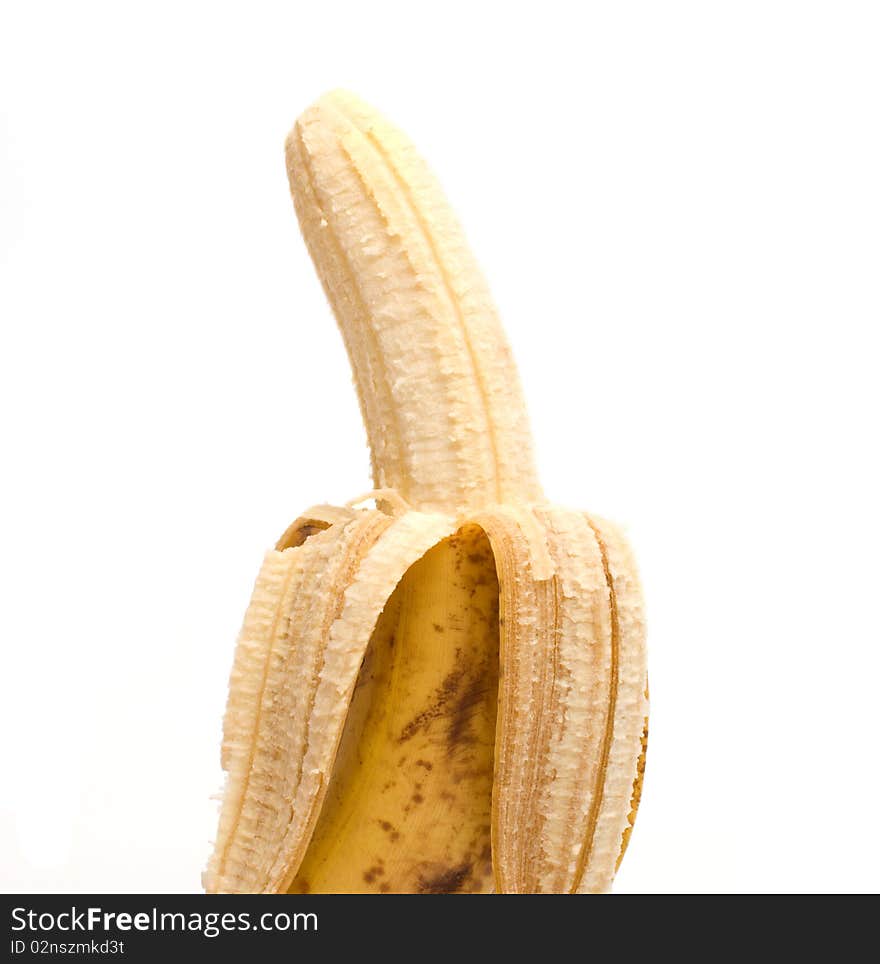 Open banana it is isolated on a white background. Open banana it is isolated on a white background.